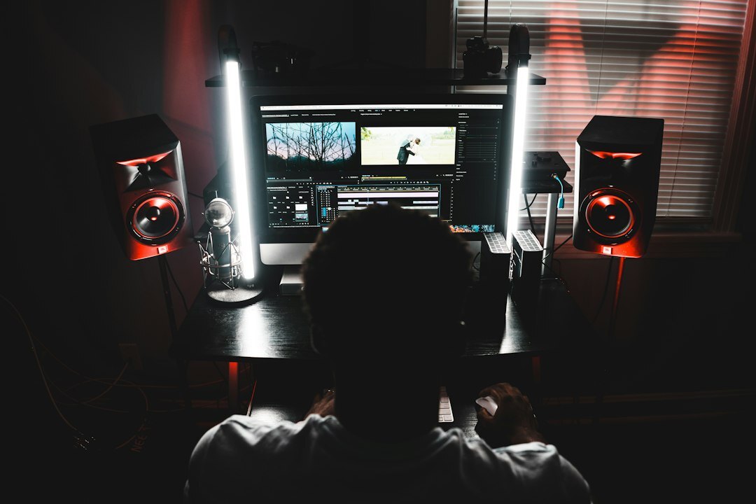video editor working on computer
